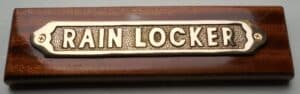 Mahogany Mounted Brass Rain Locker Sign